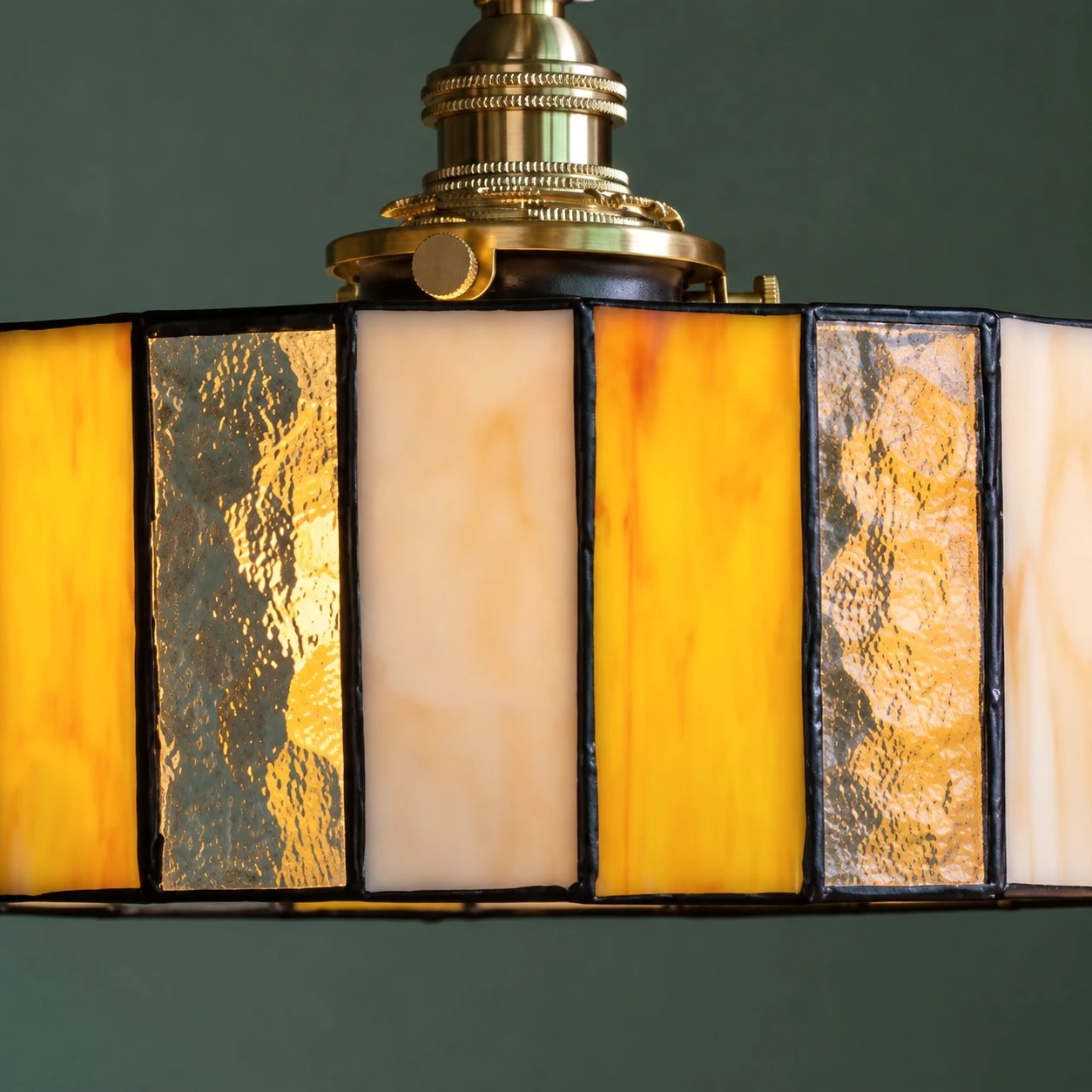 Close detail of amber and textured glass panels