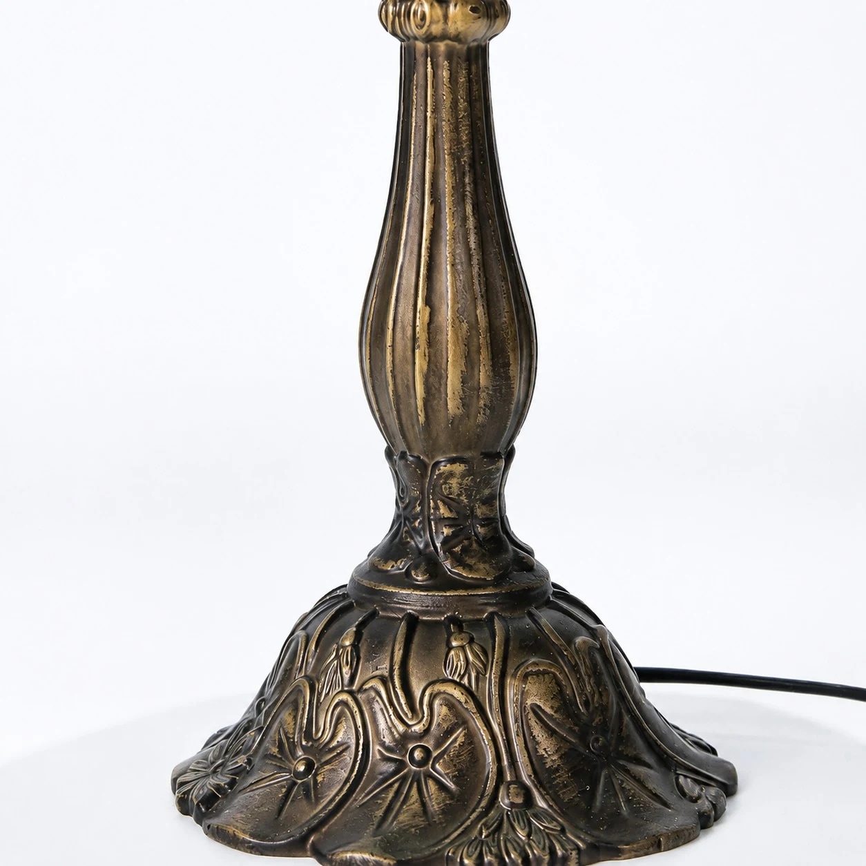 Antique tone table lamp base close-up