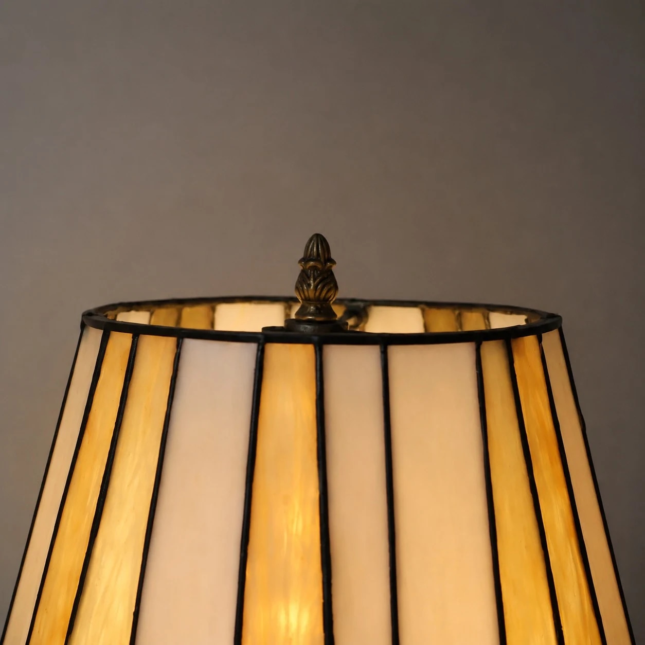 Lit stained glass lampshade close-up