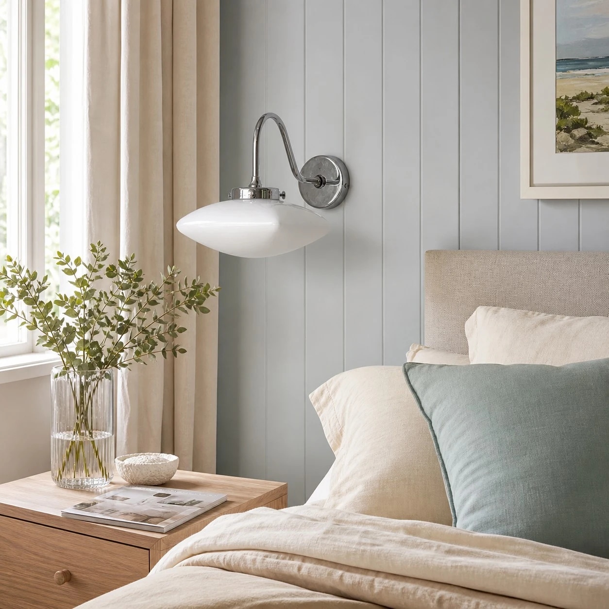 Vintage glass wall sconce on a paneled bedroom wall